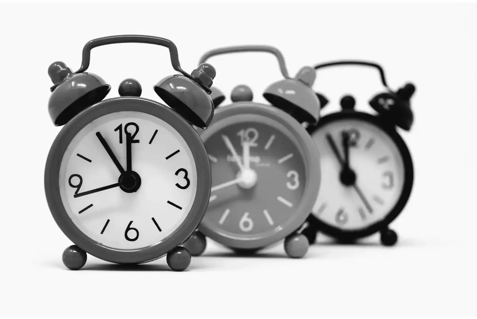 Vintage alarm clocks illustrating timeline and faith to just believe in jesus